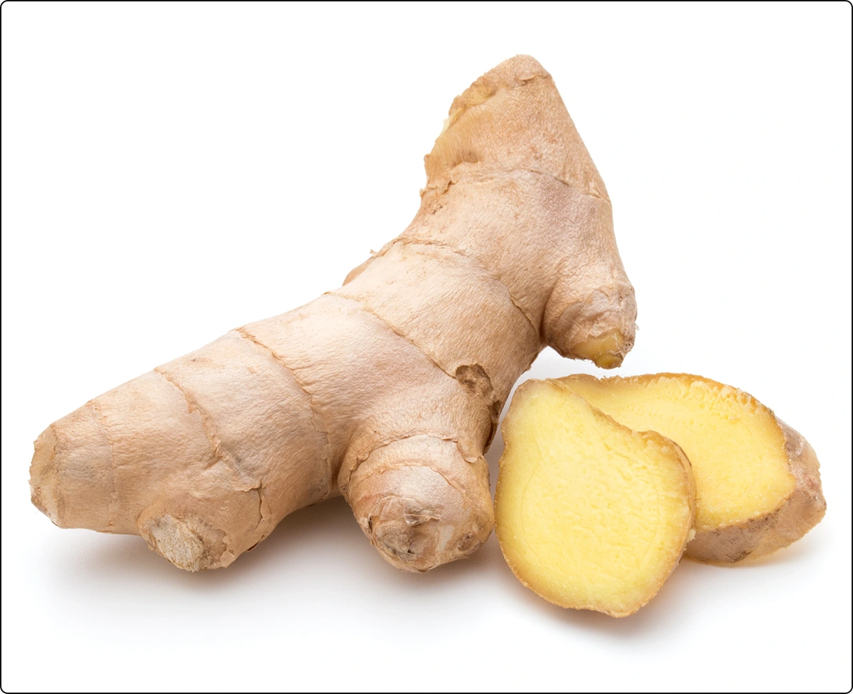 ginger root with sliced ginger on white background, compounds in ginger support respiratory health